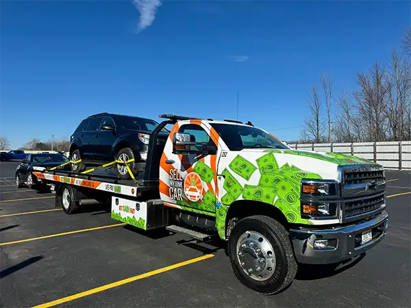 Sell My Junk Car Tow Truck carrying car